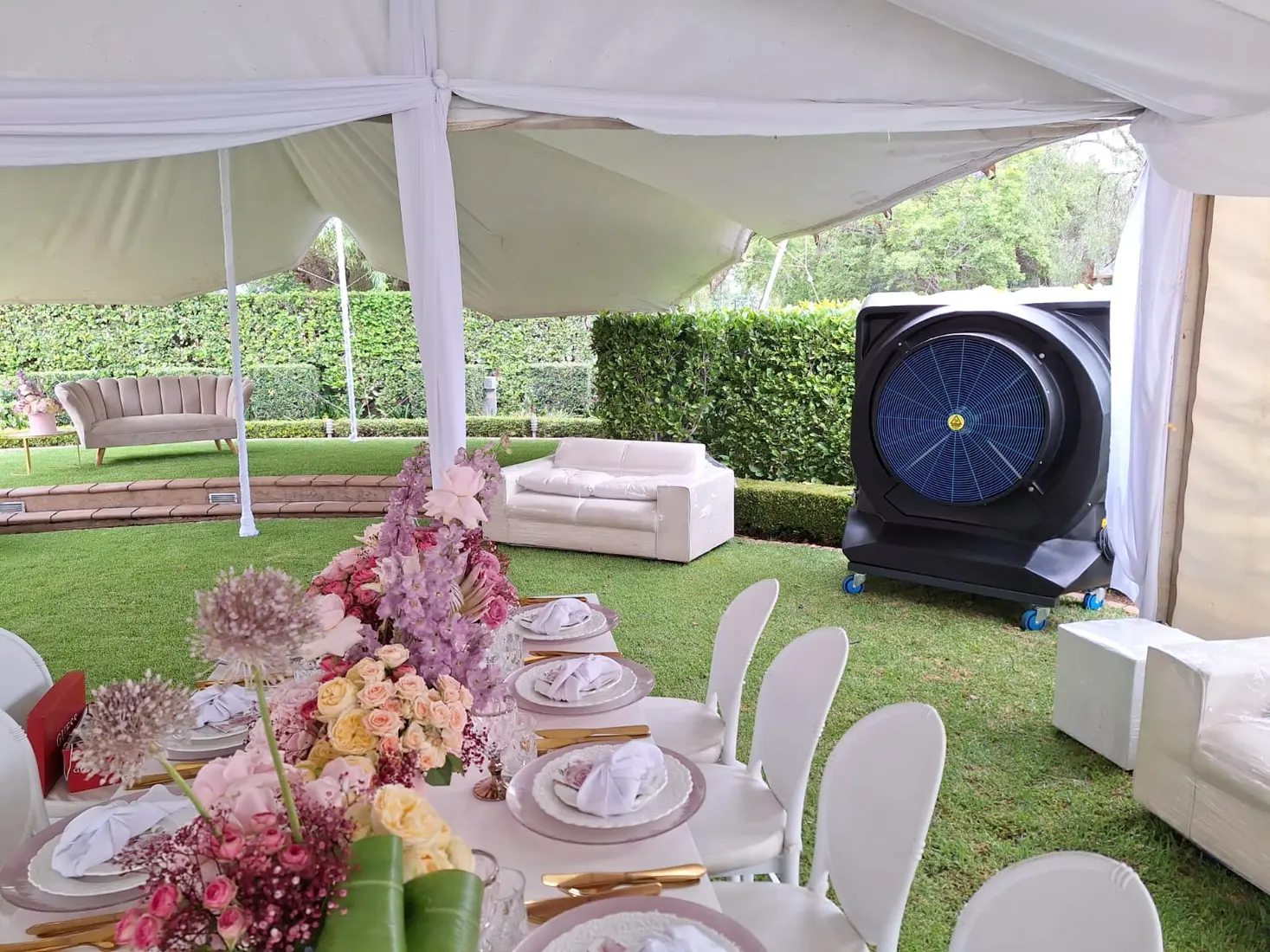 MaxCool Omega providing fresh-air cooling inside a wedding marquee
